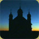 Still of a Ukrainian church at dawn, from a music video for Everett Laroi.